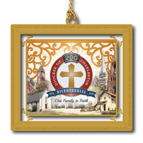 Commemorative gold framed ornament with red circle and cross gold cross in the middle