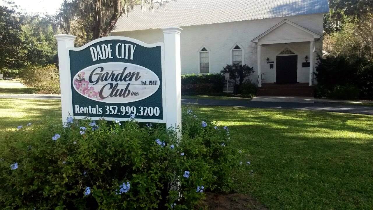 picture of Dade City Garden Club with green grass and bushes