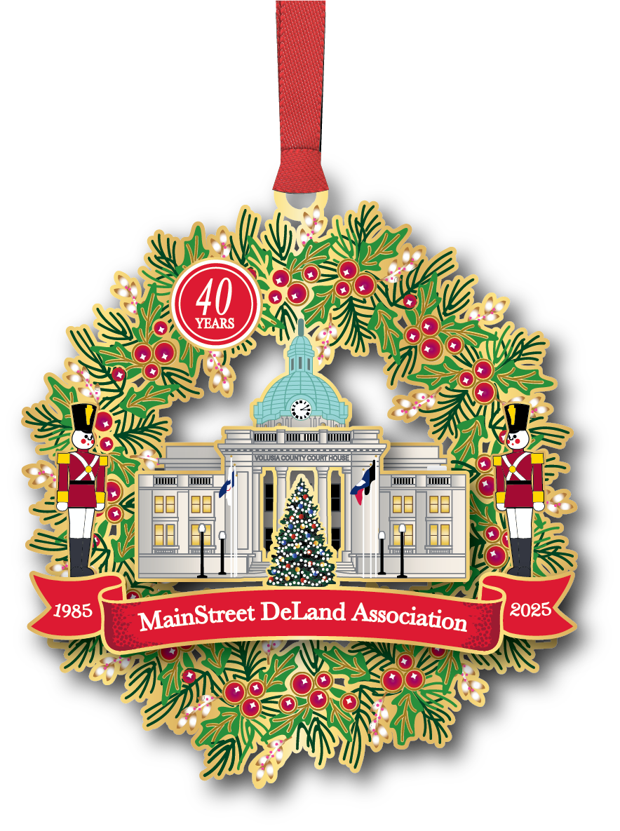 MainStreet DeLand Association 40 Years commemorative ornament featuring Volusia County Courthouse framed by a holiday wreath with toy soldiers and ribbon banner